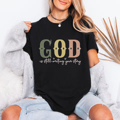 God is Still Writing Your Story | Faith & Encouragement Tee
