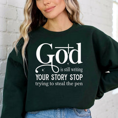 God Is Still Writing | Faith Story Sweatshirt - Luckets.com
