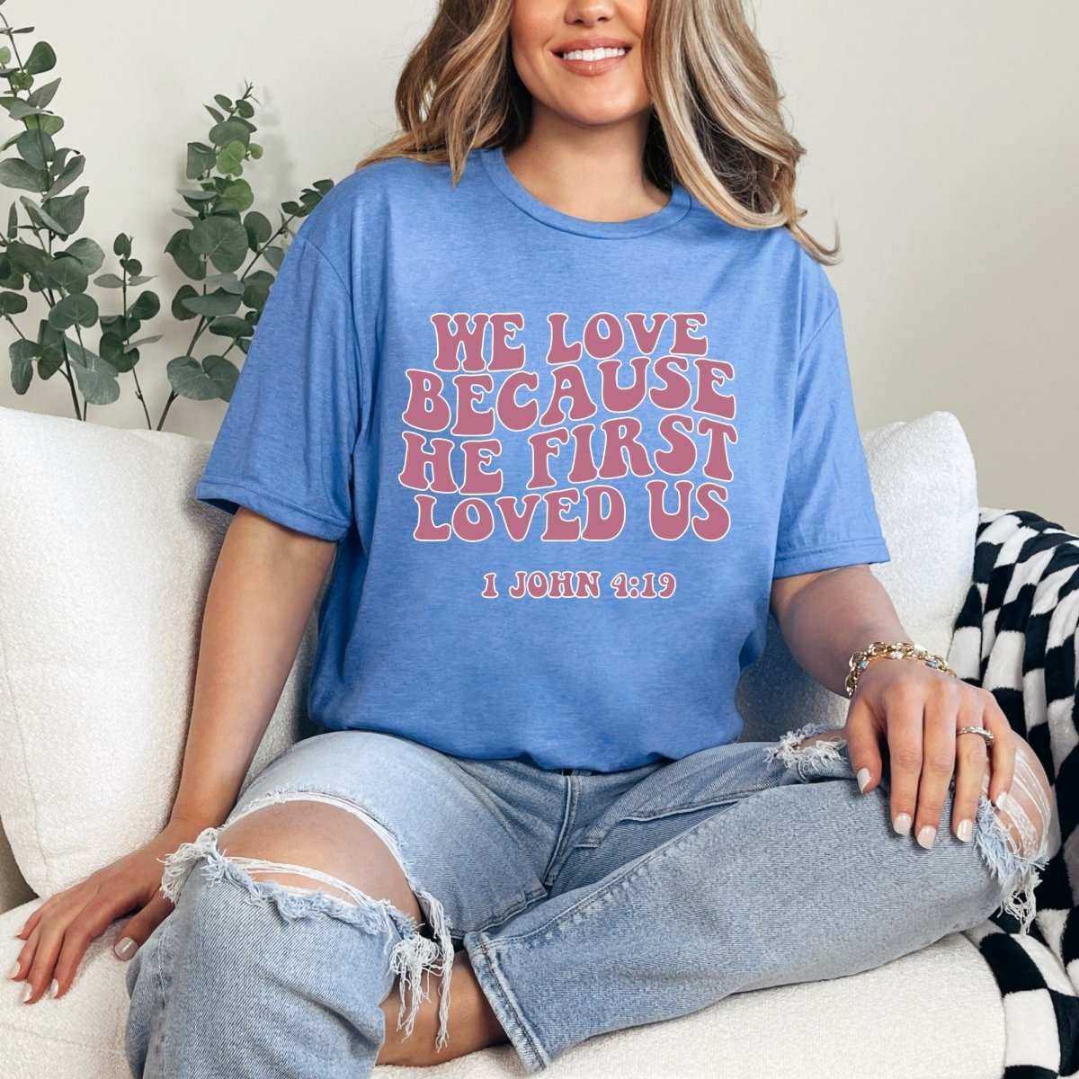 We Love | Loved Us First Love Scripture Tee - Luckets.com