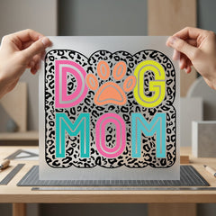 Sample of the Dog Mom leopard print transfer applied to a white t-shirt surface