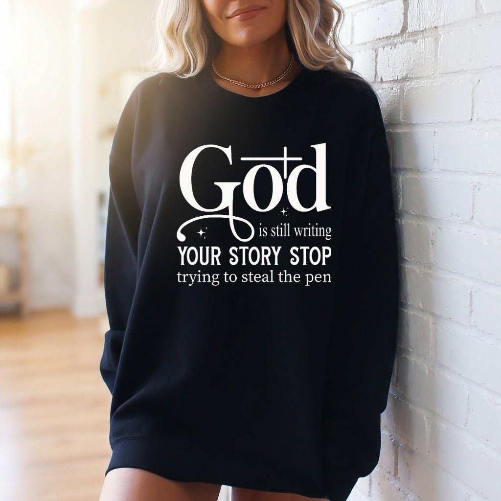God Is Still Writing | Faith Story Sweatshirt - Luckets.com