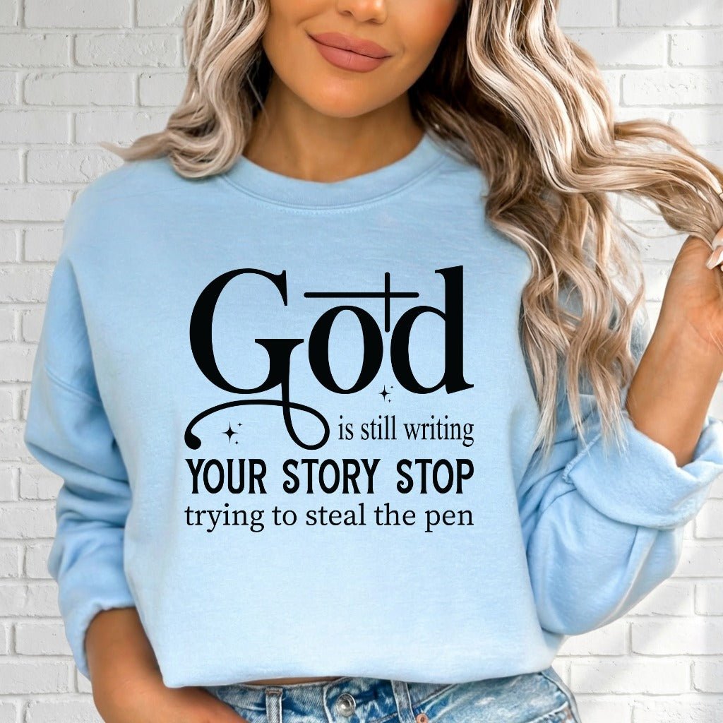 God Is Still Writing | Faith Story Sweatshirt - Luckets.com