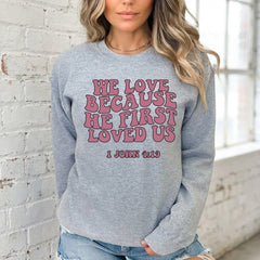 He First Loved Us | Retro Scripture Sweatshirt - Luckets.com
