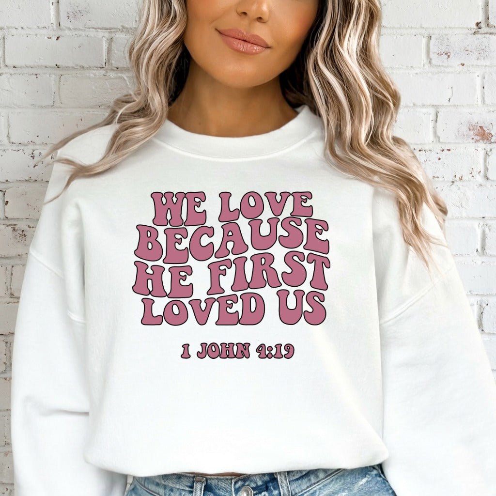 He First Loved Us | Retro Scripture Sweatshirt - Luckets.com